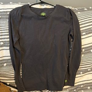 Underneath scrub shirt healing hands